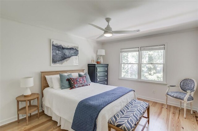 1038 Huntcliff, Atlanta, GA 30350 - bedroom with crown molding, baseboards, a ceiling fan, and wood finished floors