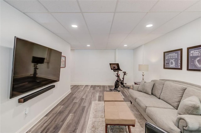 1038 Huntcliff, Atlanta, GA 30350 - living area with recessed lighting, a paneled ceiling, baseboards, and wood finished floors