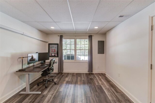 1038 Huntcliff, Atlanta, GA 30350 - office area with a paneled ceiling, electric panel, recessed lighting, wood finished floors, and baseboards