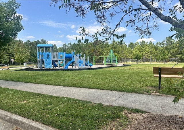 view of play area featuring a lawn