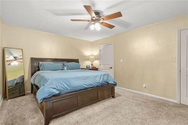 150 Victoria Sta, Woodstock, GA 30189 - bedroom with light colored carpet, baseboards, ceiling fan, and a textured ceiling