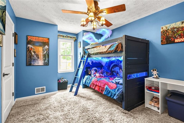 150 Victoria Sta, Woodstock, GA 30189 - bedroom with a textured ceiling, carpet flooring, baseboards, and a ceiling fan