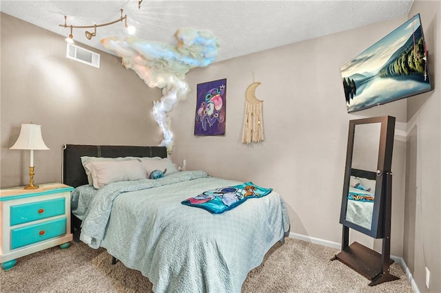 150 Victoria Sta, Woodstock, GA 30189 - bedroom with carpet floors, a textured ceiling, and baseboards