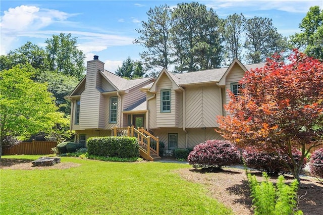 150 Victoria Sta, Woodstock, GA 30189 - view of front facade with a chimney and an outdoor fire pit