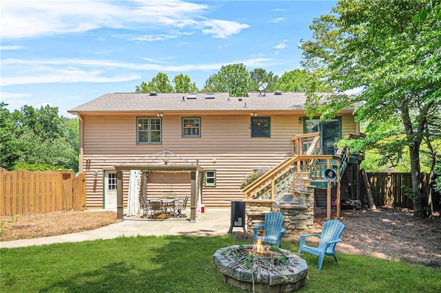 150 Victoria Sta, Woodstock, GA 30189 - rear view of house with a patio, an outdoor fire pit, and stairs
