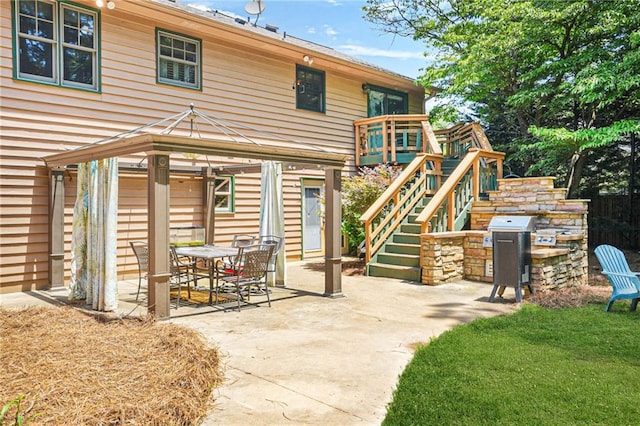 150 Victoria Sta, Woodstock, GA 30189 - rear view of property featuring a patio, stairway, and a gazebo
