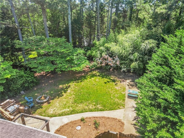 150 Victoria Sta, Woodstock, GA 30189 - view of grassy yard featuring an outdoor fire pit
