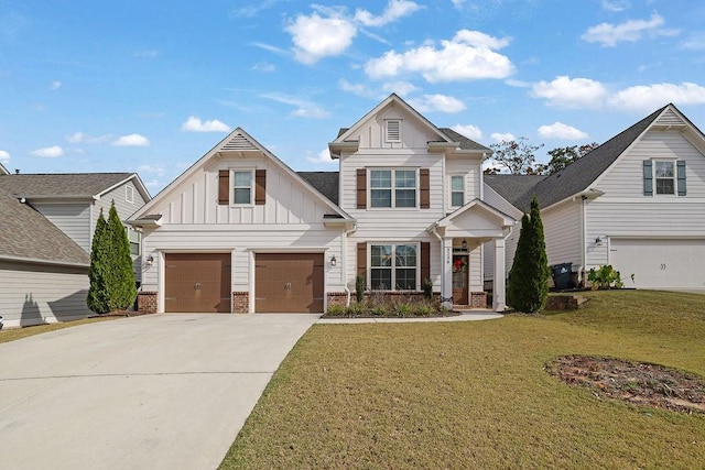 craftsman-style home featuring a front lawn and a garage