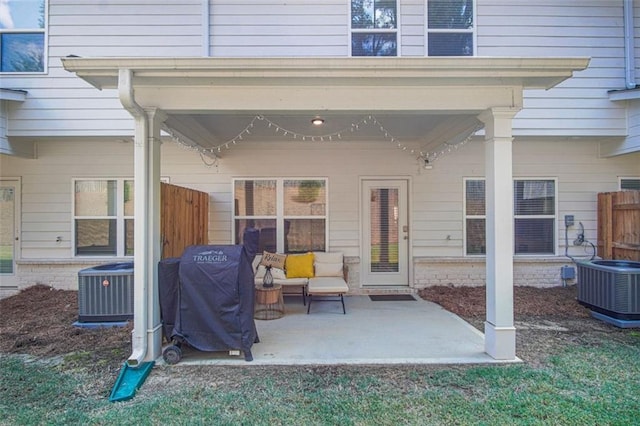 view of patio / terrace featuring area for grilling and central air condition unit