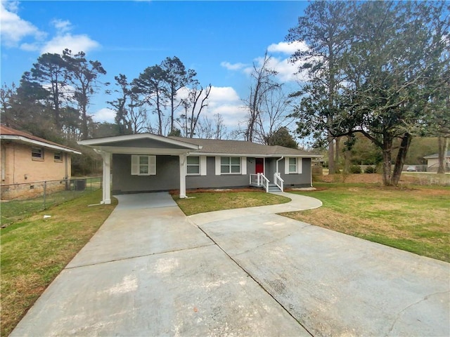 ranch-style home with a carport and a front yard