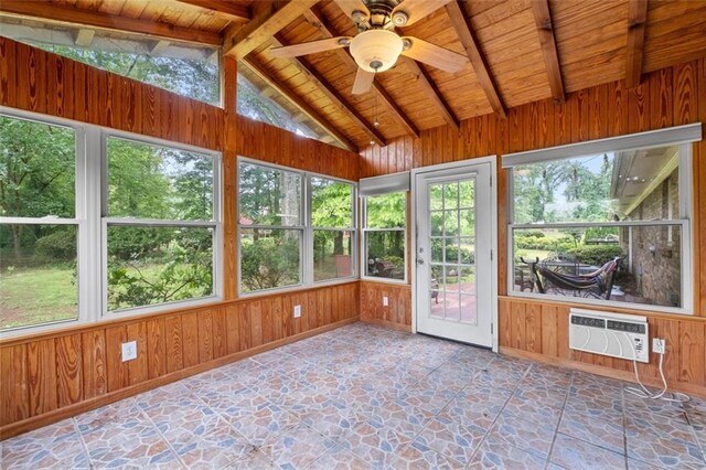 1690 Cedar Grove Dr, Marietta, GA 30066 - unfurnished sunroom featuring an AC wall unit, stone floors, wood ceiling, wood walls, and baseboards