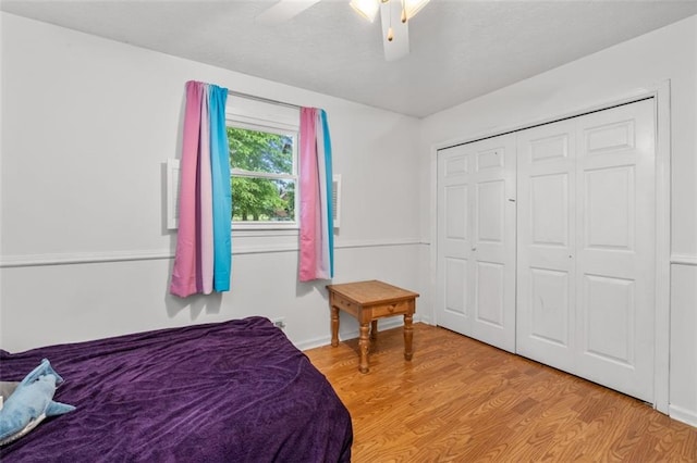 1690 Cedar Grove Dr, Marietta, GA 30066 - bedroom with ceiling fan, a closet, and light wood-style flooring