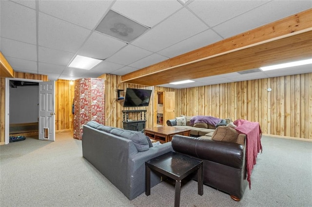 1690 Cedar Grove Dr, Marietta, GA 30066 - carpeted living area featuring a paneled ceiling, wooden walls, baseboards, and a fireplace