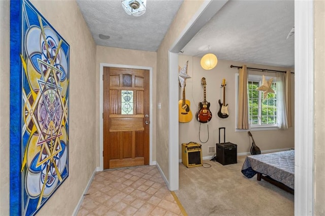 1690 Cedar Grove Dr, Marietta, GA 30066 - entryway featuring a textured ceiling and baseboards