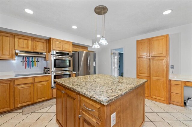1690 Cedar Grove Dr, Marietta, GA 30066 - kitchen featuring stainless steel appliances, a center island, light tile patterned flooring, light stone counters, and recessed lighting