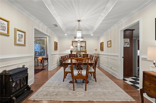 3330 Overland Dr, Roswell, GA 30075 - dining room with dark wood-style flooring, crown molding, a chandelier, wainscoting, and a tray ceiling