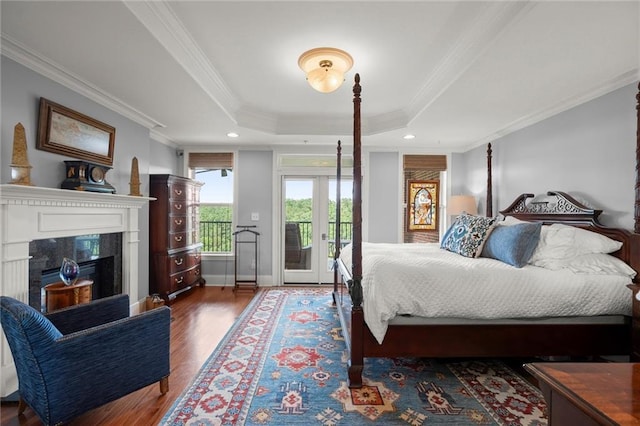 3330 Overland Dr, Roswell, GA 30075 - bedroom featuring a raised ceiling, ornamental molding, access to outside, wood finished floors, and a fireplace