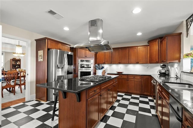 3330 Overland Dr, Roswell, GA 30075 - kitchen featuring island range hood, dark flooring, stainless steel appliances, a center island, and a sink