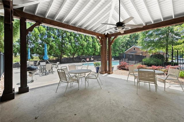 3330 Overland Dr, Roswell, GA 30075 - fenced backyard featuring a ceiling fan, a patio area, and outdoor dining space