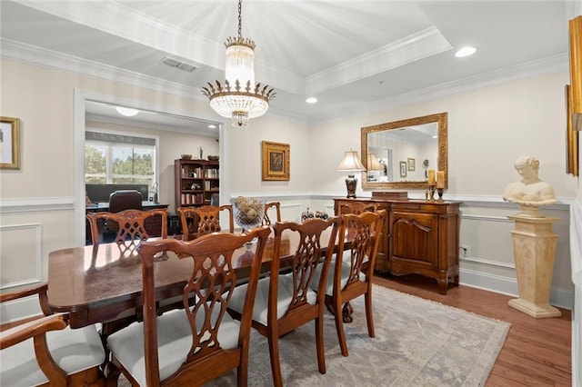 3330 Overland Dr, Roswell, GA 30075 - dining area with a wainscoted wall, ornamental molding, wood finished floors, a chandelier, and recessed lighting