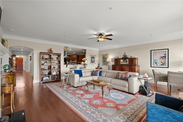 3330 Overland Dr, Roswell, GA 30075 - living area with arched walkways, a ceiling fan, crown molding, dark wood finished floors, and baseboards