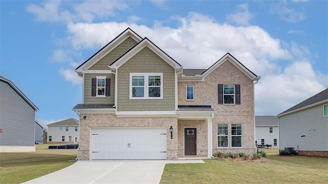 craftsman-style home with a front yard, a garage, and central air condition unit