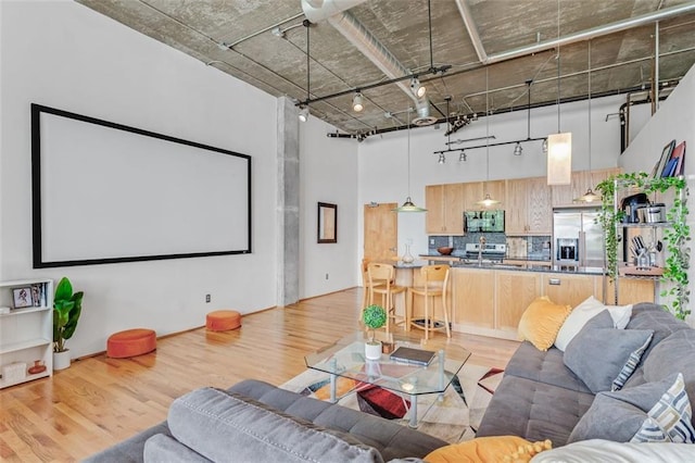 3235 Roswell Rd NE Unit 702, Atlanta, GA 30305 - cinema featuring a high ceiling and light wood-style flooring