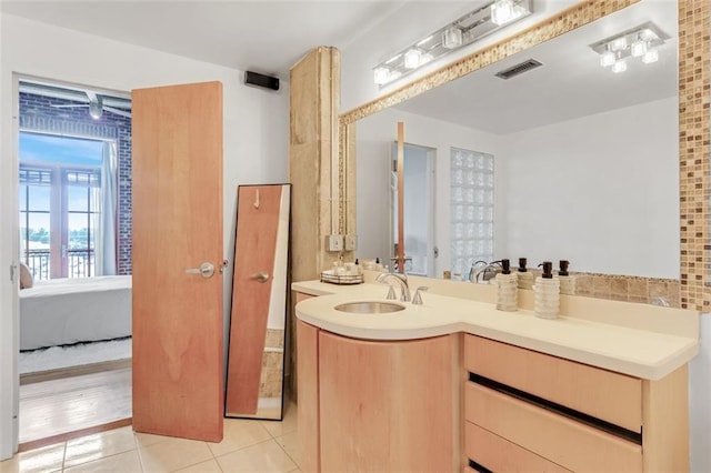 3235 Roswell Rd NE Unit 702, Atlanta, GA 30305 - ensuite bathroom with tile patterned flooring and vanity