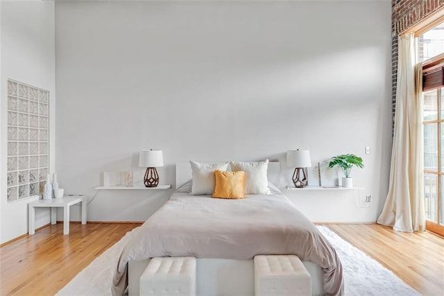 3235 Roswell Rd NE Unit 702, Atlanta, GA 30305 - bedroom with wood finished floors