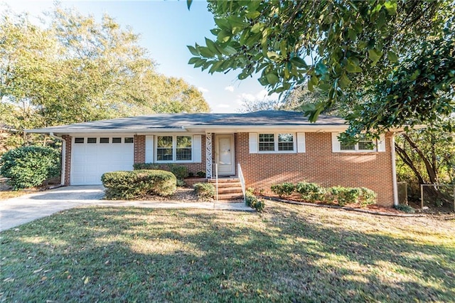 ranch-style house with concrete driveway, brick siding, a front lawn, and an attached garage