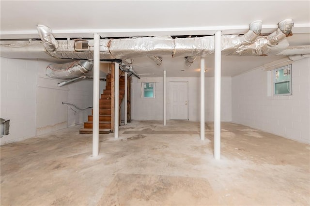 basement featuring concrete block wall