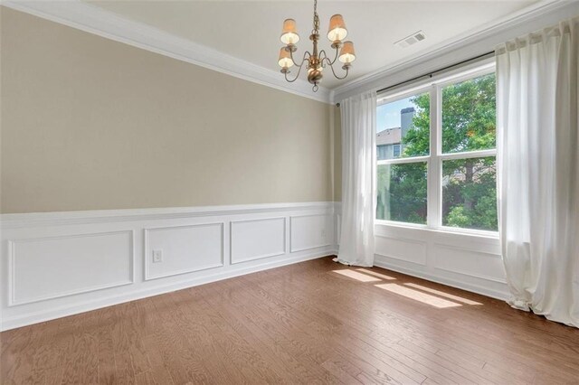 213 Roseman Way, Woodstock, GA 30188 - unfurnished living room with plenty of natural light, dark wood-type flooring, a ceiling fan, and french doors