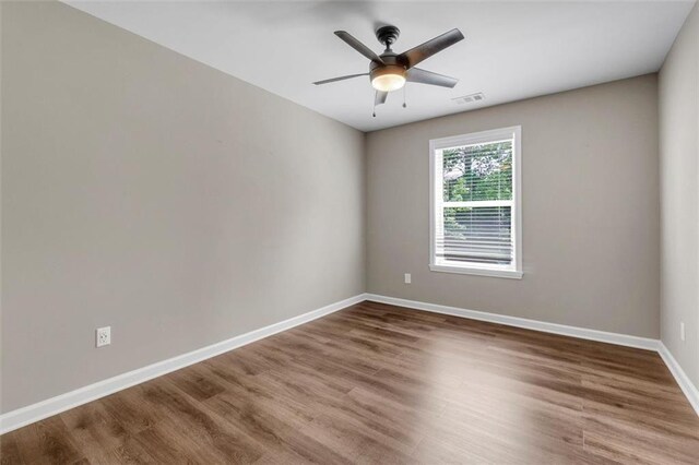 213 Roseman Way, Woodstock, GA 30188 - full bathroom featuring wood finished floors, a shower stall, and vanity