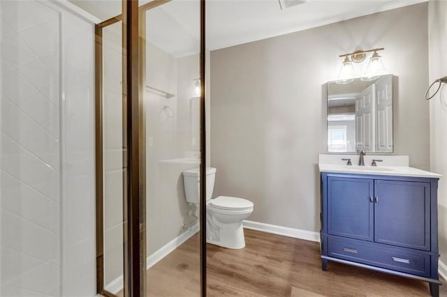 213 Roseman Way, Woodstock, GA 30188 - full bathroom featuring wood finished floors, a shower stall, and vanity