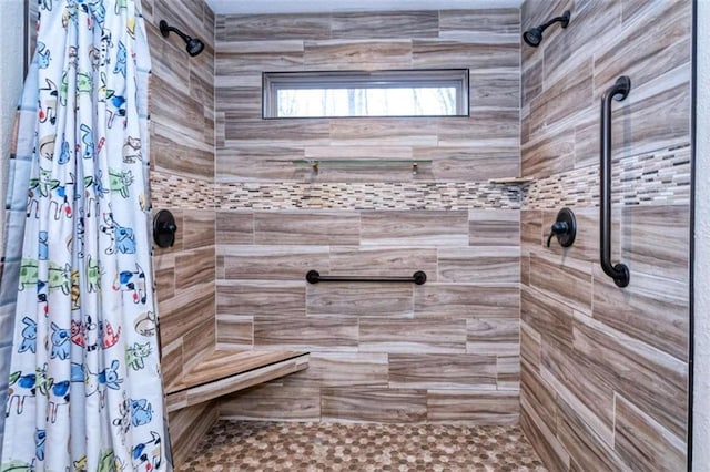 bathroom with a shower with curtain