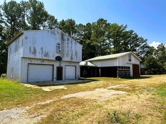 garage with a lawn