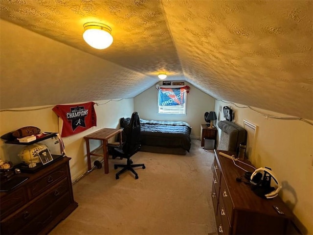 bedroom featuring lofted ceiling, light carpet, and a textured ceiling