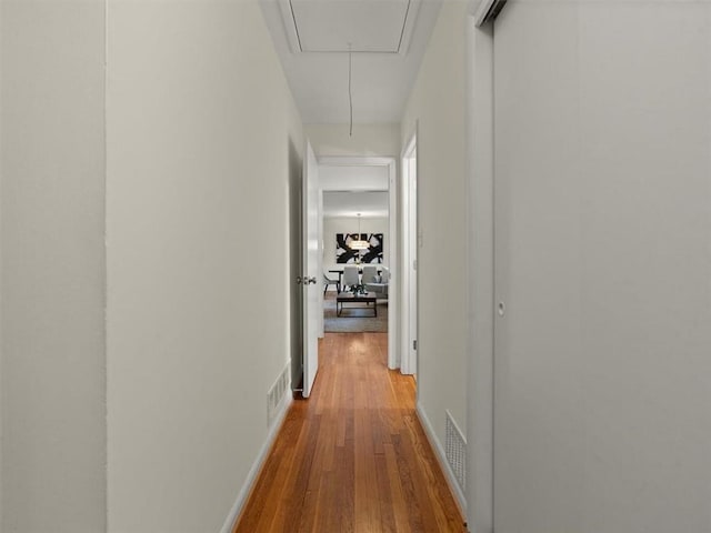 hall featuring hardwood / wood-style floors