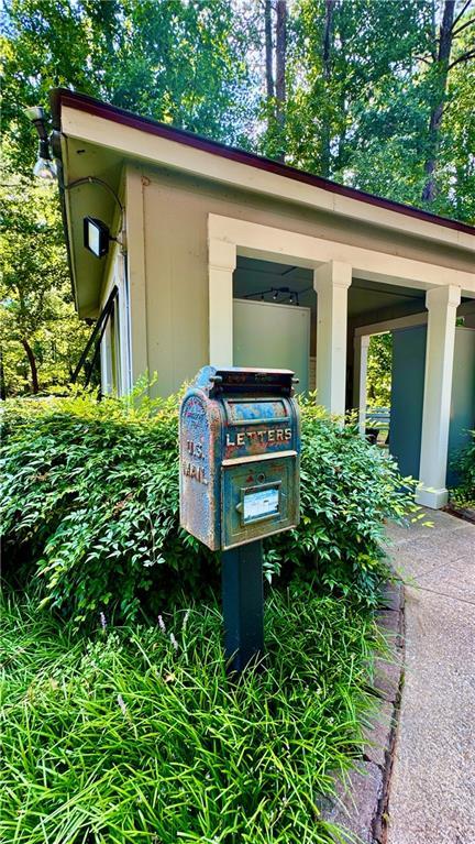 details with mail area and aphalt driveway