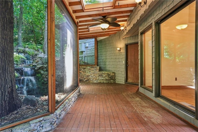 562 Pine Valley Rd SE, Marietta, GA 30067 - unfurnished sunroom featuring a skylight and beamed ceiling