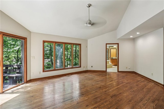 562 Pine Valley Rd SE, Marietta, GA 30067 - spare room with plenty of natural light, lofted ceiling, a ceiling fan, wood finished floors, and recessed lighting