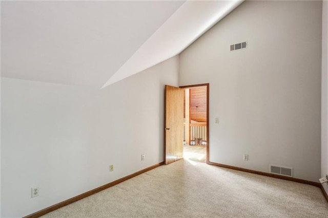 562 Pine Valley Rd SE, Marietta, GA 30067 - empty room featuring carpet floors and high vaulted ceiling