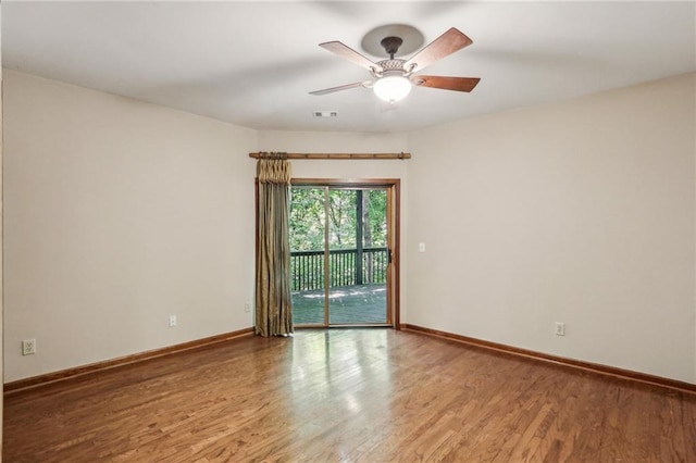 562 Pine Valley Rd SE, Marietta, GA 30067 - unfurnished room with wood finished floors and ceiling fan
