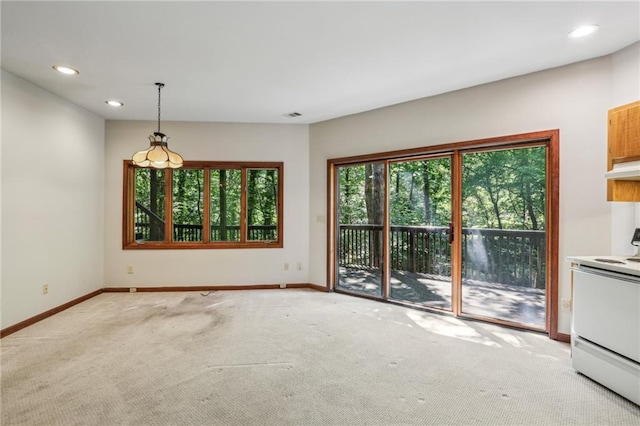 562 Pine Valley Rd SE, Marietta, GA 30067 - unfurnished dining area with light carpet and recessed lighting