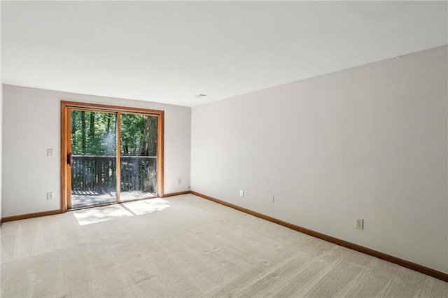562 Pine Valley Rd SE, Marietta, GA 30067 - carpeted empty room featuring baseboards