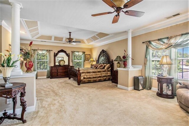 bedroom with ornate columns, coffered ceiling, ceiling fan, crown molding, and carpet floors