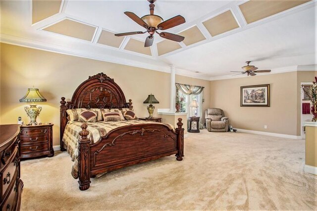 carpeted bedroom with ceiling fan and crown molding