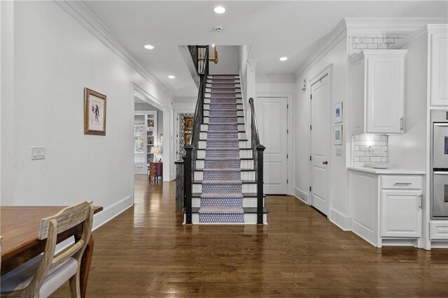 3075 Woodvale Ct, Alpharetta, GA 30022 - foyer entrance featuring ornamental molding, stairs, dark wood finished floors, baseboards, and recessed lighting