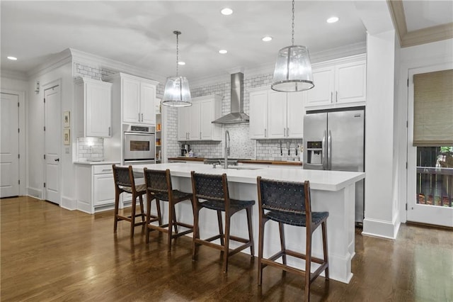 3075 Woodvale Ct, Alpharetta, GA 30022 - kitchen with wall chimney exhaust hood, crown molding, decorative backsplash, light countertops, and dark wood-type flooring