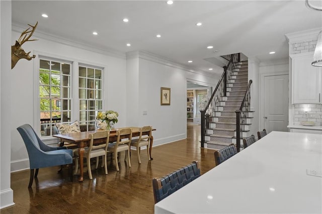 3075 Woodvale Ct, Alpharetta, GA 30022 - dining room featuring ornamental molding, baseboards, wood finished floors, recessed lighting, and stairway